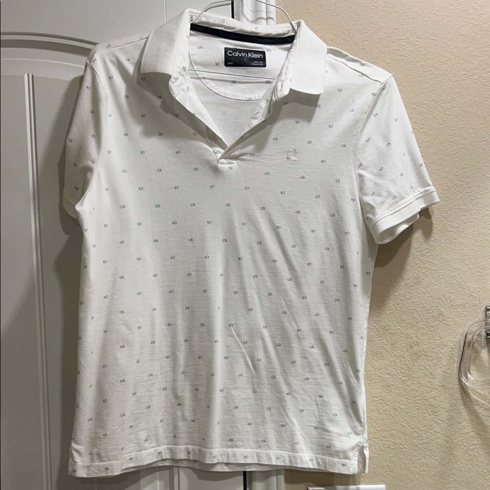 Calvin Klein Men's Polo Shirt in White with Subtle Pattern
